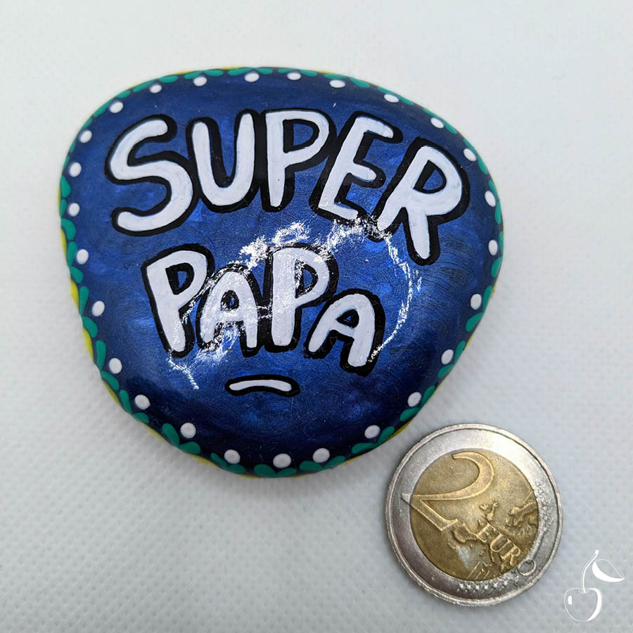 Galet "Super Papa" bleu métallisé avec une bordure en pointillé