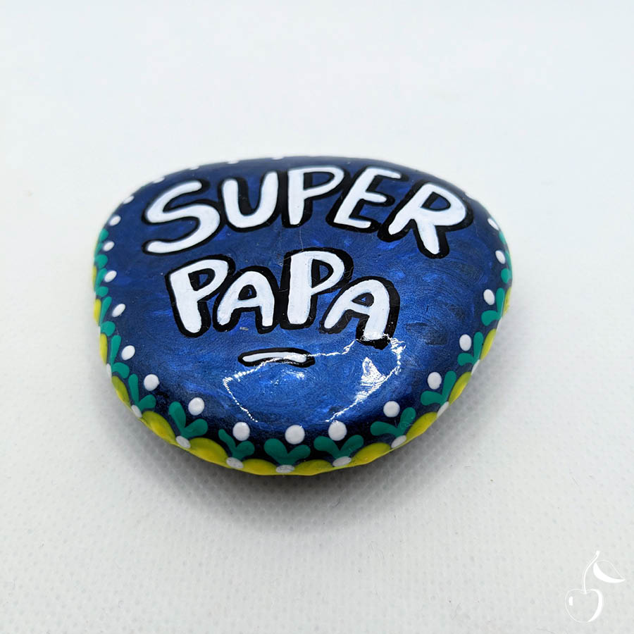 Galet "Super Papa" bleu métallisé avec une bordure en pointillé